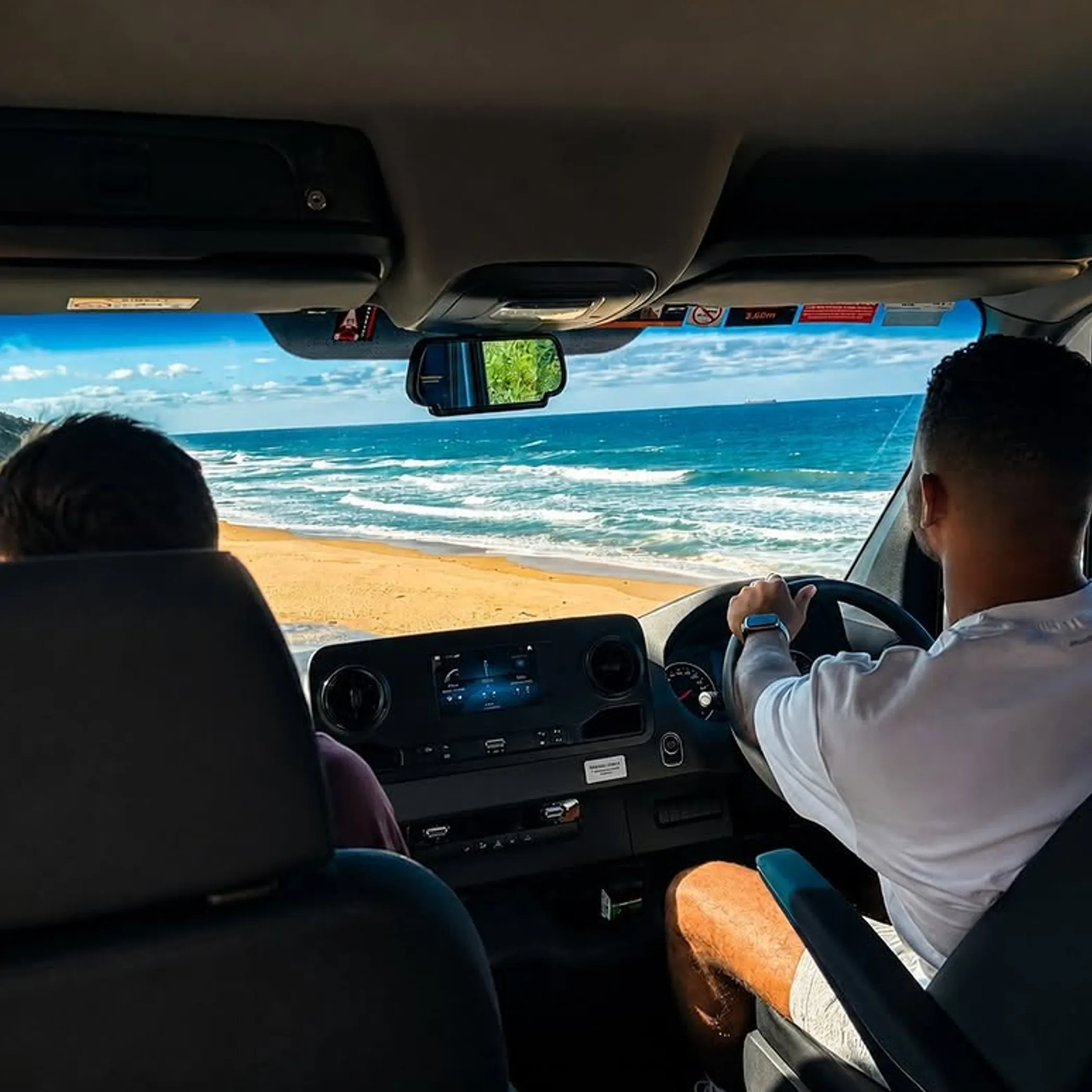 view from car on coastal road trip