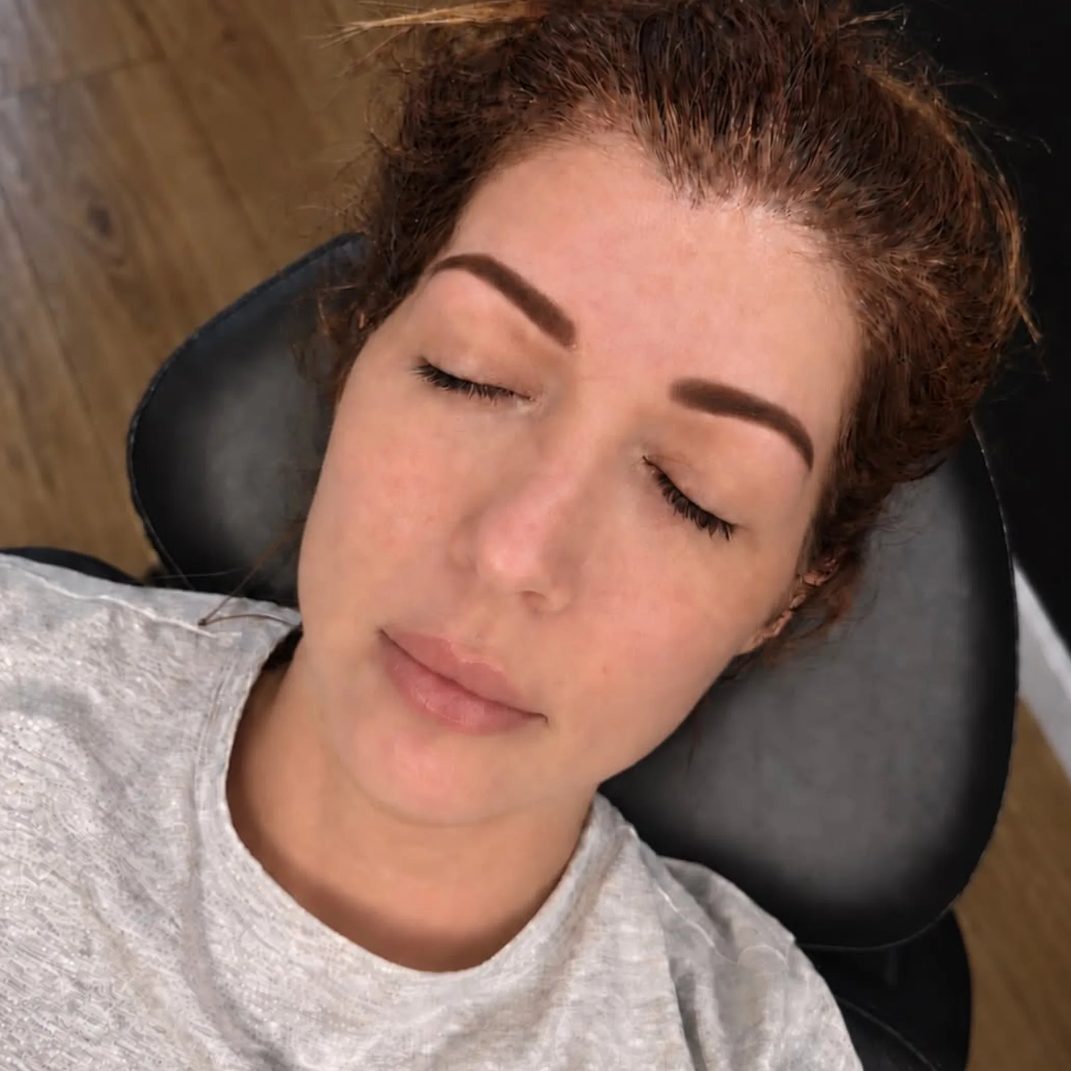 cosmetic tattooed eyebrows close-up